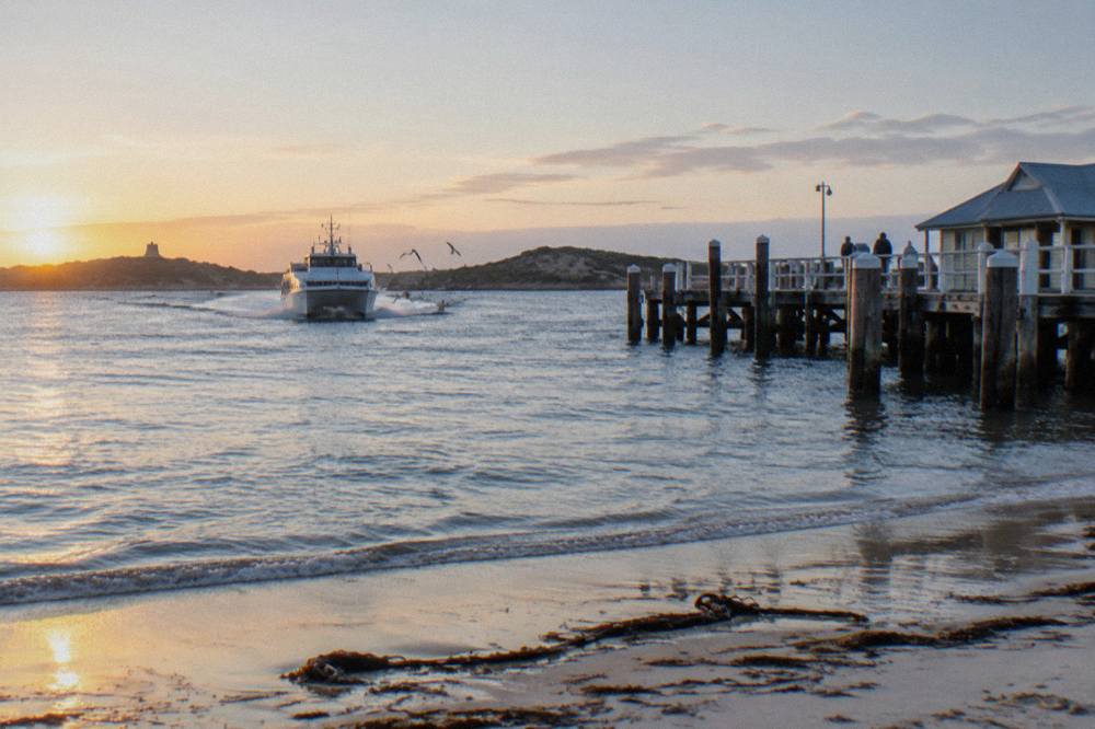 Ferry approaching the Rottnest Island Main Jetty across open water